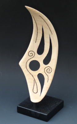 Maple. 220mm high. Cut from a bowl then carved and decorated. Ref 13.12