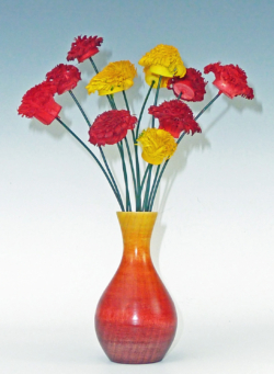 Flowers turned from 20 mm diameter hazel twigs. Coloured with felt pens. Ref 11.34