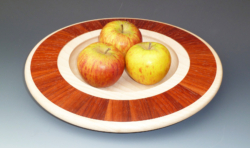 Sycamore with inset of padauk segments.. 260 mm diameter. Ref 12.03