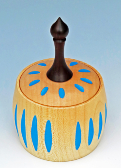 Sycamore. 70 mm diameter. Routed sides and top had blue painted grooves partially turned away. Ref 18.14