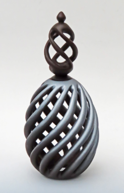 Sycamore stained and painted. 90 mm diameter x 210 mm total heightg. 12 bines (spirals). Inspired by Stuart Mortimer's spirals. Ref 21.10